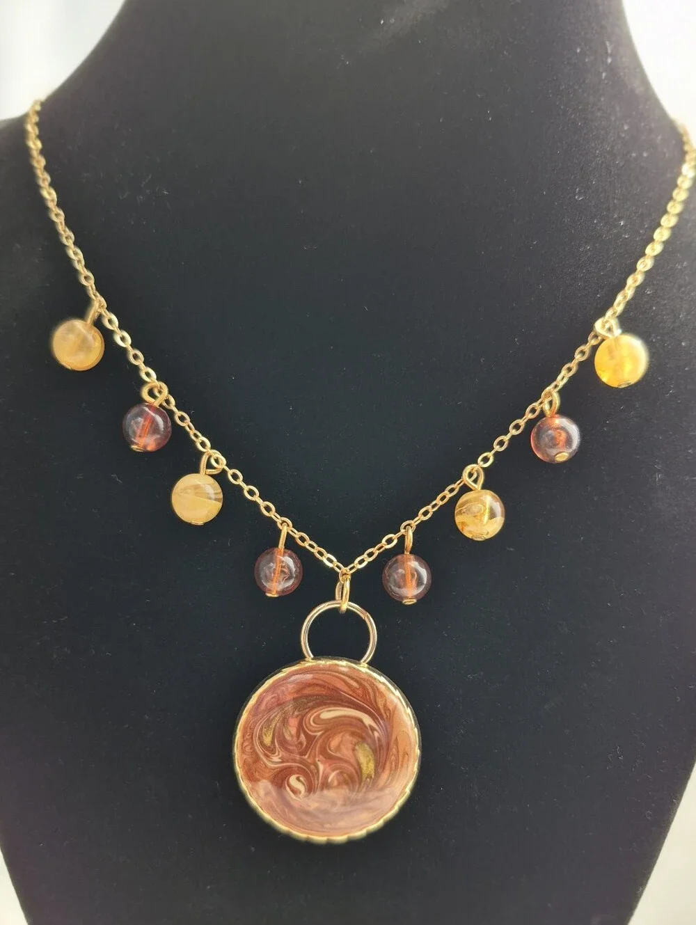 Reimagined Goldtone Swirl Pendant Necklace